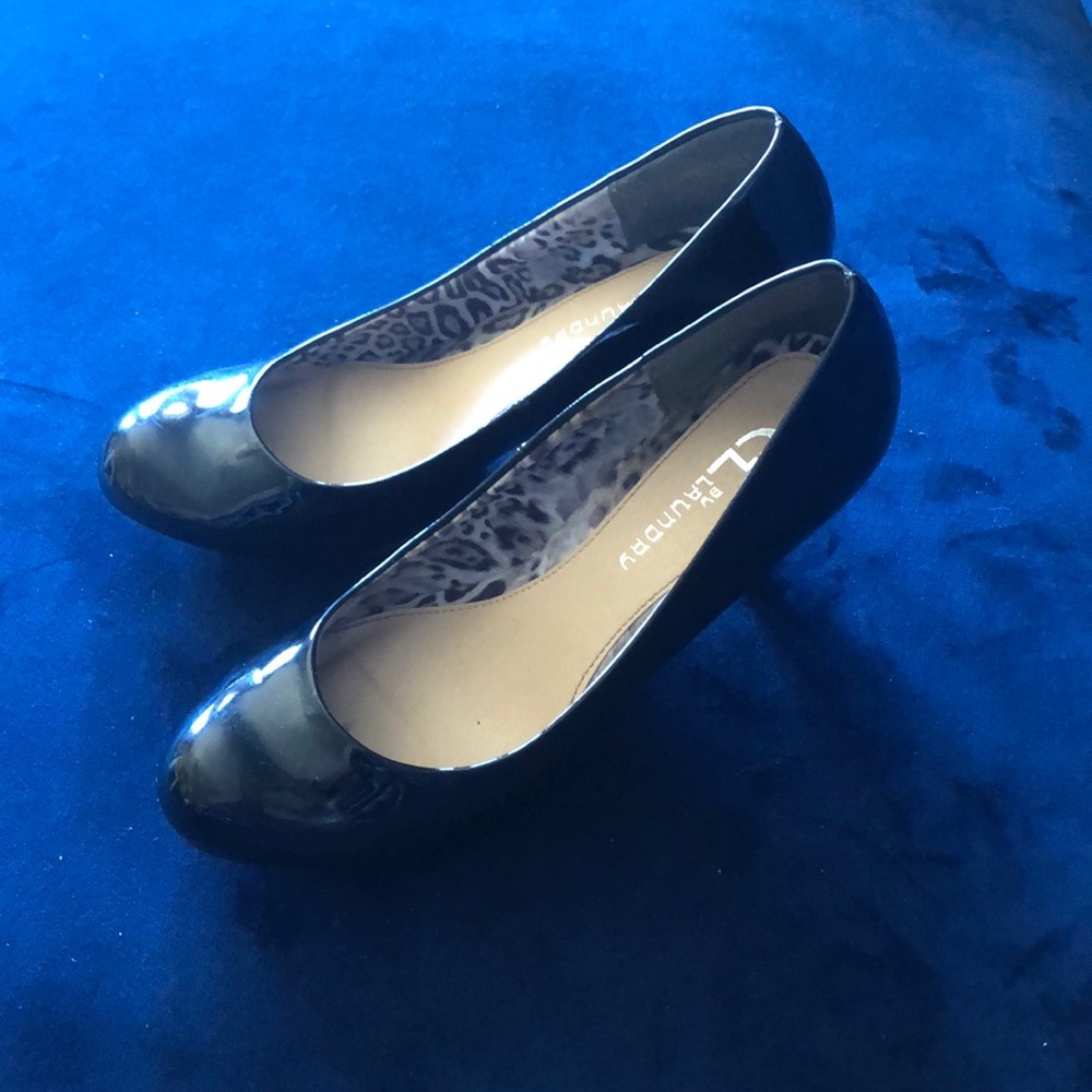Almond toe black patent leather pumps
